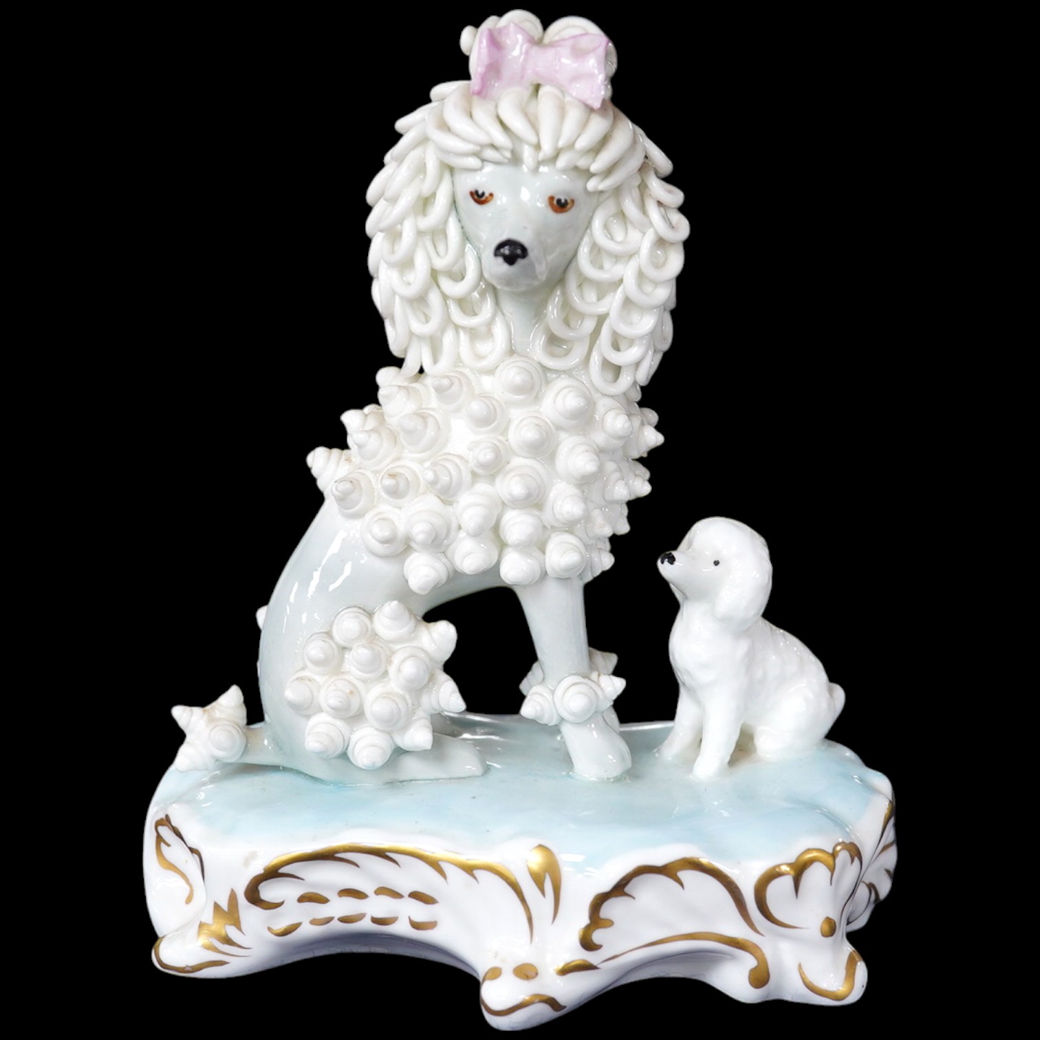 A Doris Dawson poodle group, signed to the base, 14.5cm high. Condition - good